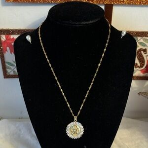 Elegant Gold and Silver Pendant Necklace